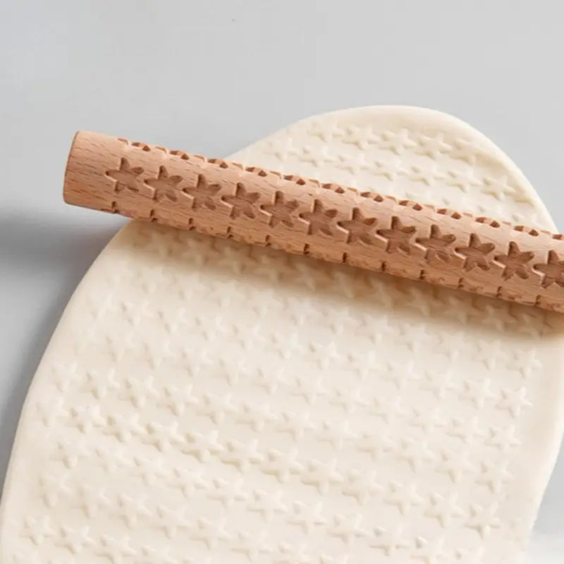 Holzwalze mit Sternstruktur